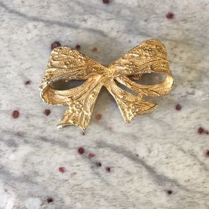 Gold vintage bow brooch